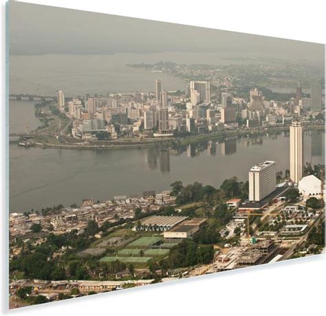 Uitzicht over Abidjan Plexiglas 120x80 cm - Foto print op Glas